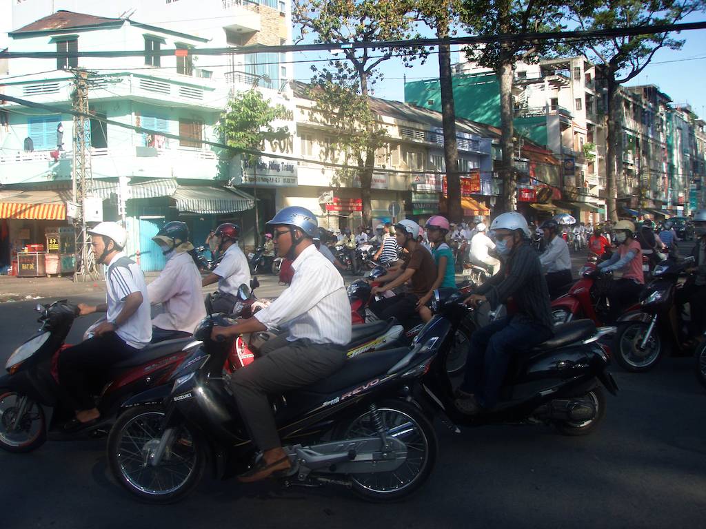 Motorbikes Crossing at Intersection in Ho Chi Minh City