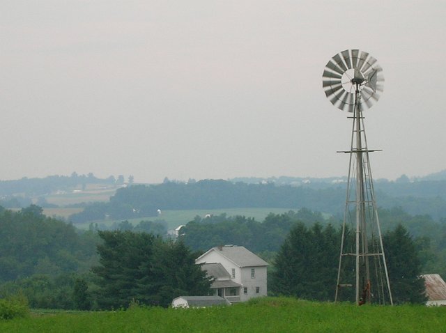Wind energy pump supplies water to an Amish farm in Holmes County Ohio.