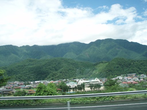 On bus. Mountains between Tokyo and Kawaguchiko on the way to see Mt. Fuji.