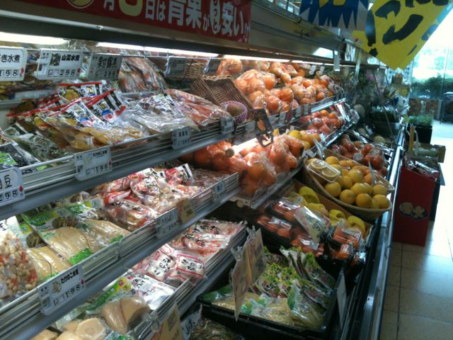 This aisle in a standalone supermarket offers fresh lemons, oranges and other snack-sized fruit, plus various packaged vegetable and fruit products, all priced to encourage healthy eating. Supermarkets also sell apples and bananas, the latter having fresh and day-old pricing. Japanese cities such as Hiroshima, Osaka, Tokyo, Nagasaki and Wakayama have standalone supermarkets, plus full groceries located in the basements of department stores. You can feel comfortable shopping at these stores by just doing it. Carry a Japanese translation dictionary as a printed book or use the free Kobota application on your iPhone or iPod touch to help communicate with store personnel.
