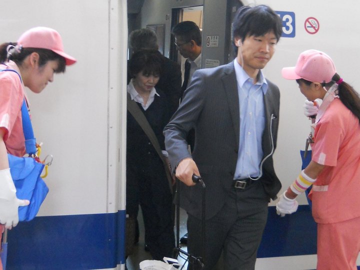 When the cleaners meet a Shinkansen at its terminus, they bow to the passengers exiting the train. They then quickly clean and prepare the Shinkansen for its next trip.