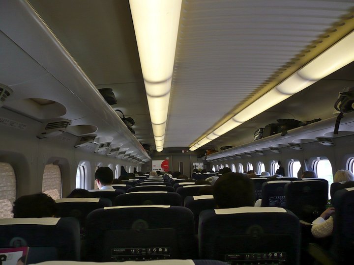 The inside of some regular Shinkansen cars seat passengers in three-two configurations. Some first class cars offer more spacious seating.