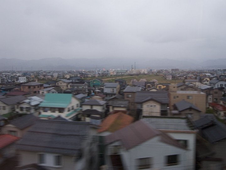 You can see the countryside from the Shinkansen. At some speeds close up scenery blurs, while distant views pass by quickly.