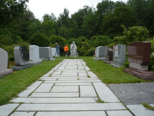 The monument garden at the Rock of Ages factory in Barre, Vermont, USA shows off some of the work created at the factory. In the center of the garden stands a granite statue representing Jesus of Nazareth, believed by Christians to be the son of God, the savior the humanity and the hope for peaceful, abundant living.