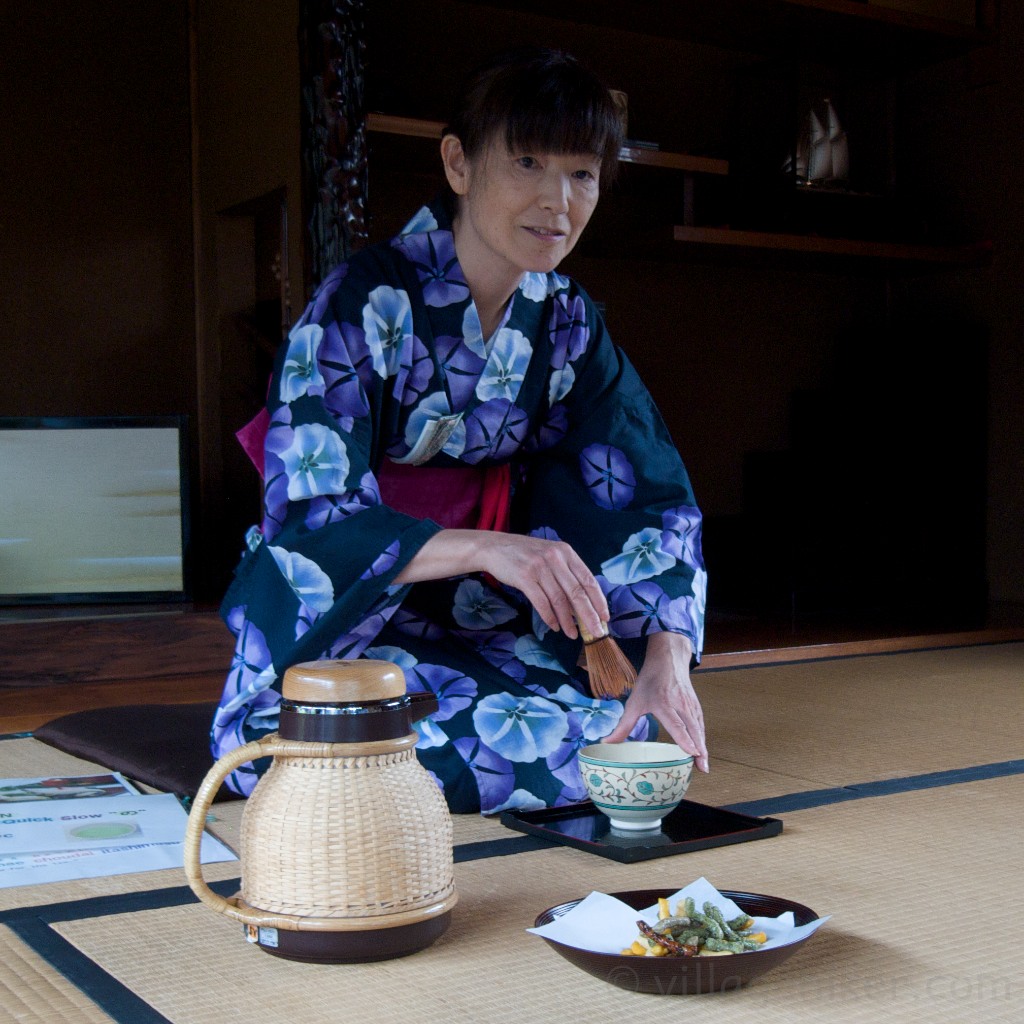 Your sensei shows the proper way to stir the tea.