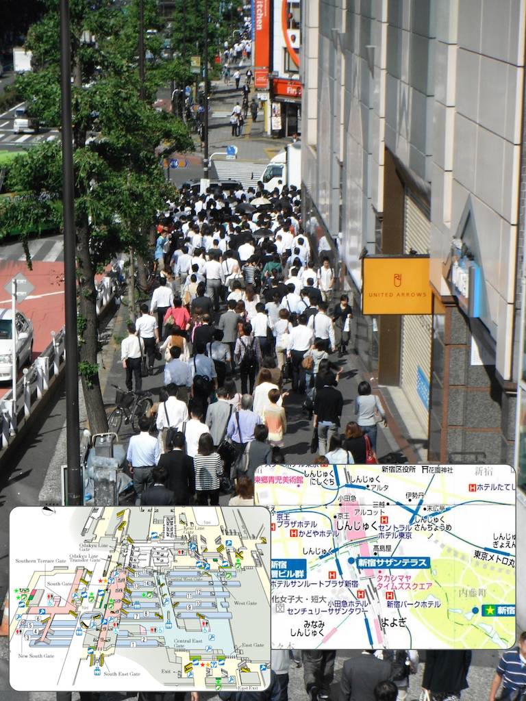 Morning Rush Hour on Sidewalk Outside Shinjuku Station