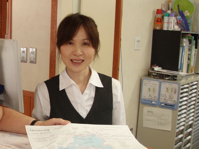 help_with_map_at_kawaguchiko_japan_tourist_office_near_mt_fuji