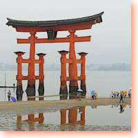 School children scurry up to O-Torii, the famous floating gate to sitting off the coast of Miyajima.