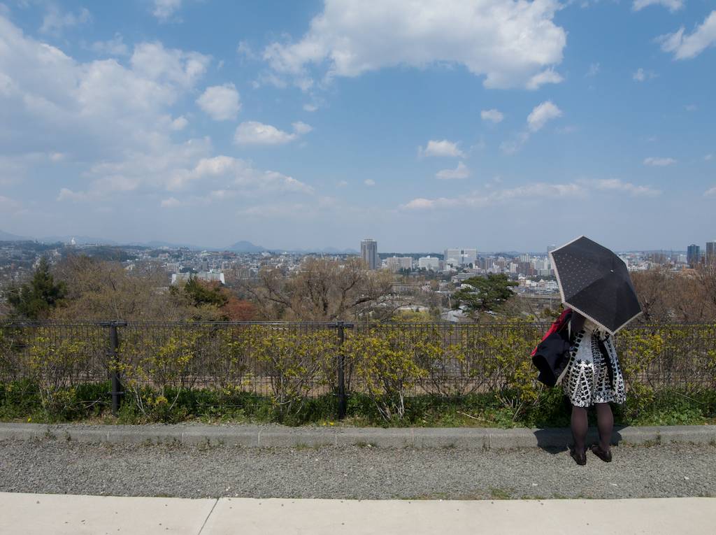 Woman Views Sendai City from Aoba Castle