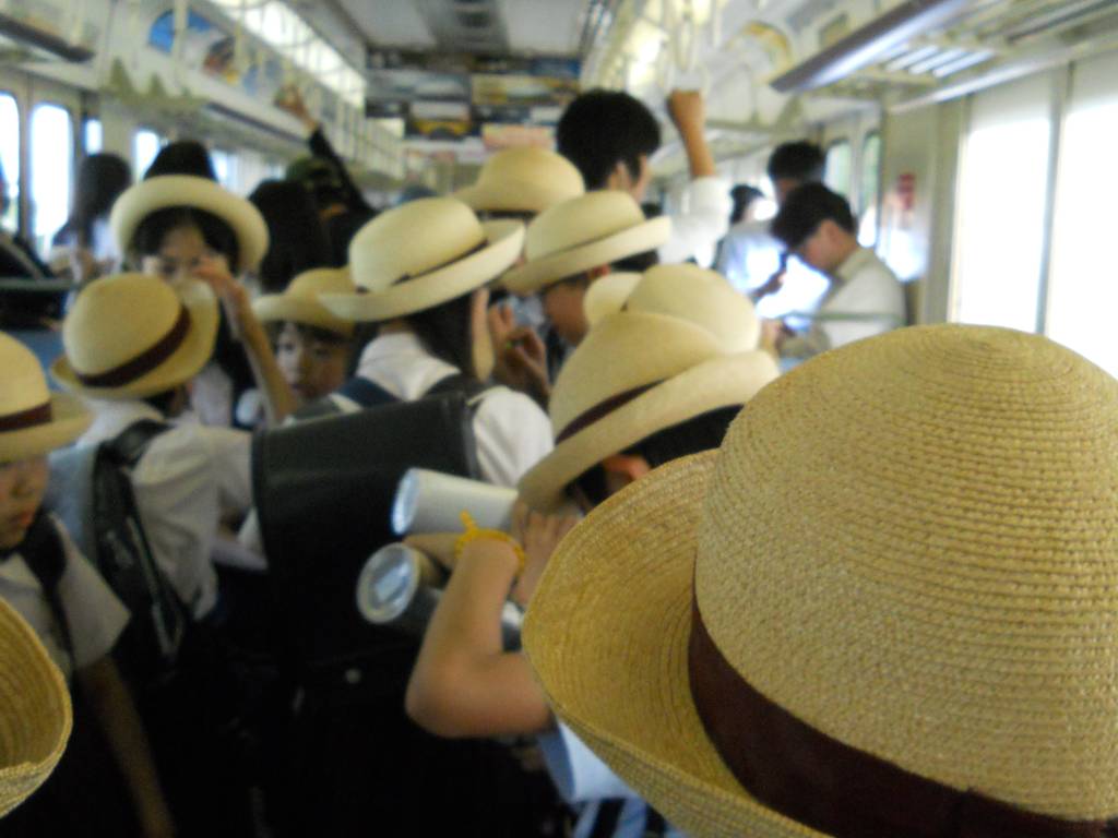 School Children Pack a Train Car