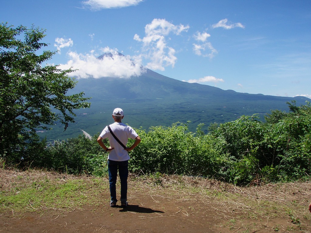 Hiker Watches Mt. Fuji From Mt. Tenjo