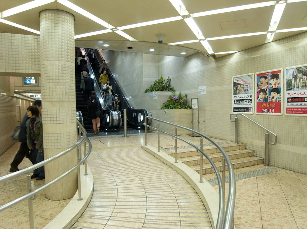 Escalator Heading Up on the Left in Osaka Japan Underground Mall