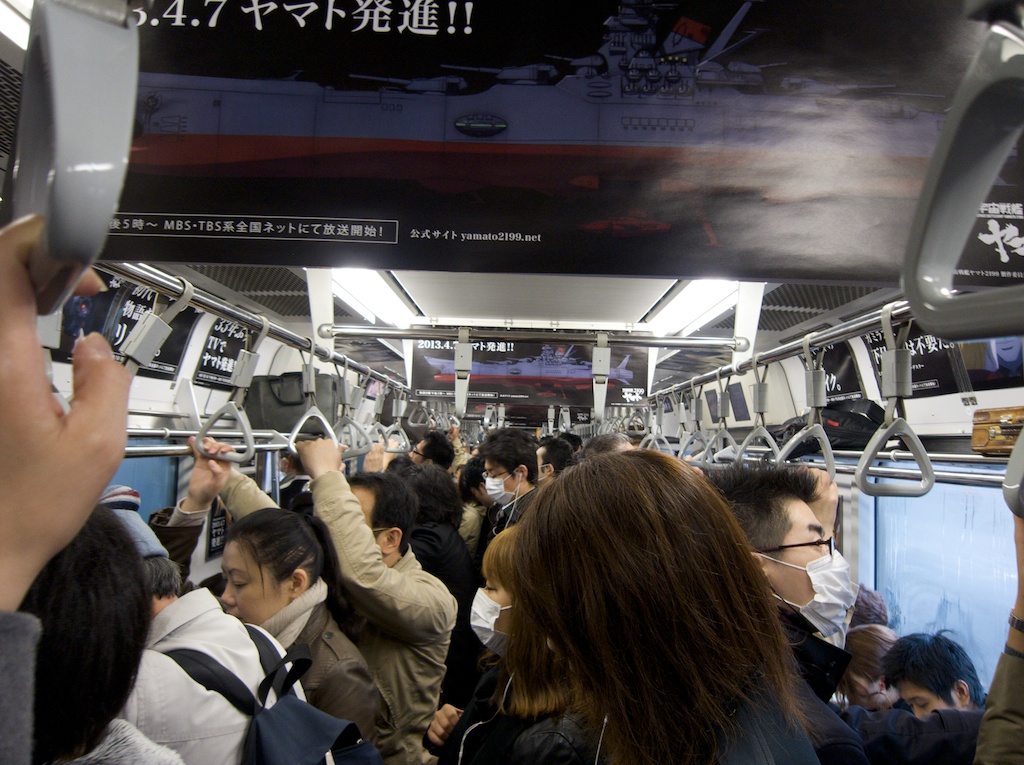 Thousands of people crowd onto commuter trains in Tokyo and other large cities. While they jostle against each other they also maintain their space.